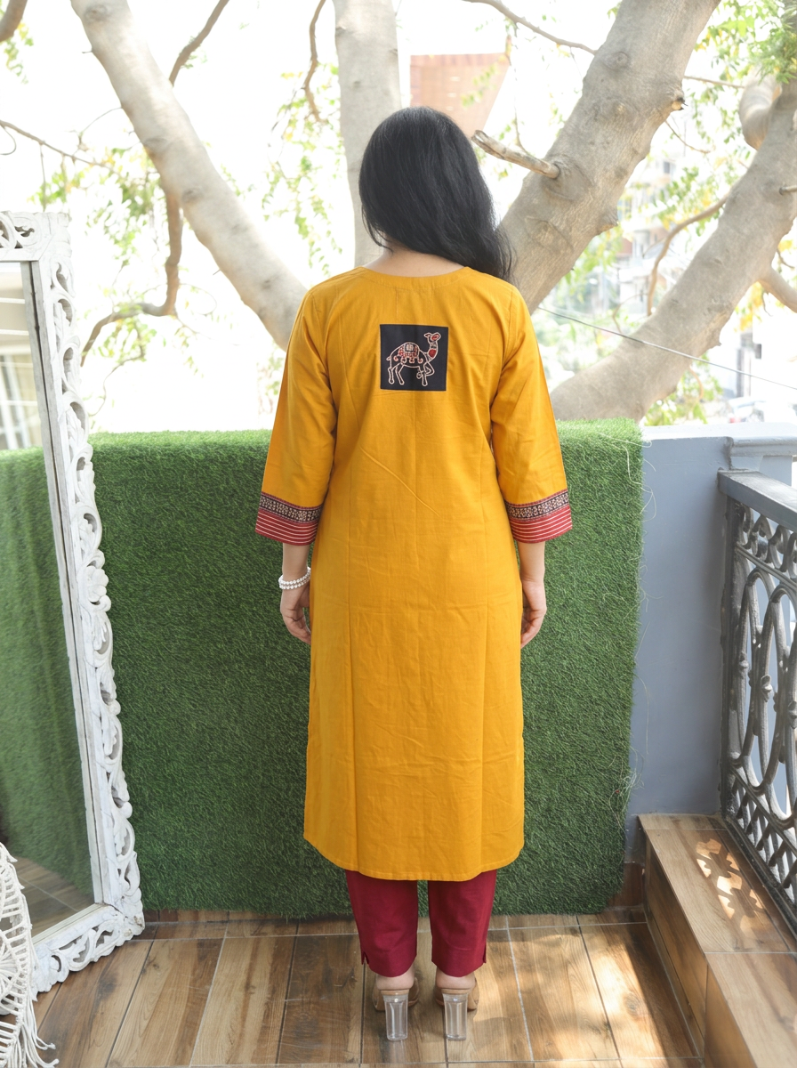 Megha Yellow Mirror Work Camel Yoke Cotton Kurti