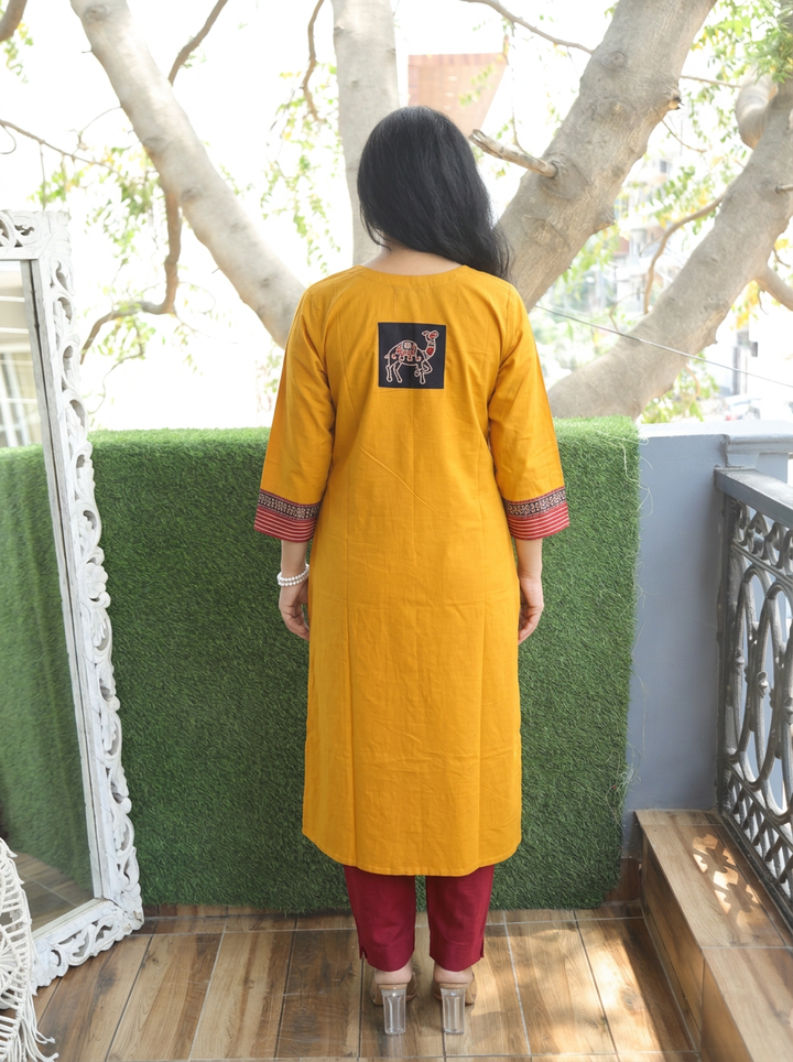Megha Yellow Mirror Work Camel Yoke Cotton Kurti