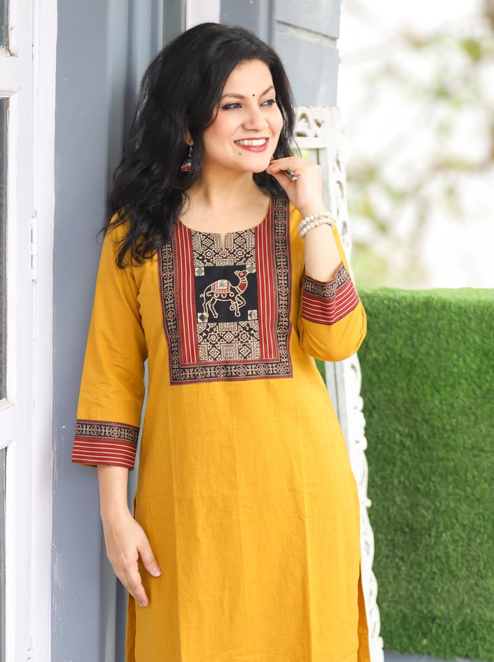 Megha Yellow Mirror Work Camel Yoke Cotton Kurti