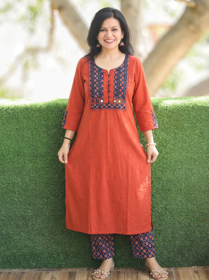 Raadhi Rust Orange Potli with Mirror Ajrak Yoke Cotton 2 Piece Set