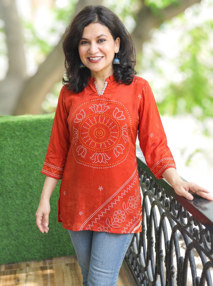 Mansi Bright Orange Bandhani Print Crepe Short Kurti